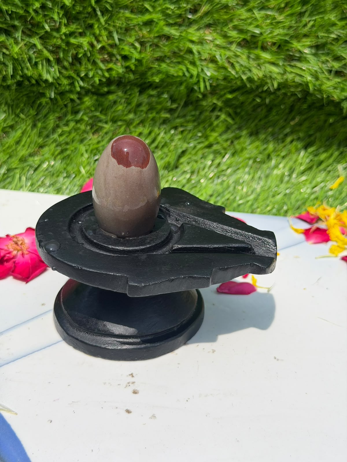 2-inch Narmadeshwar Shivling · Rust Crown on Taupe — Original product photo