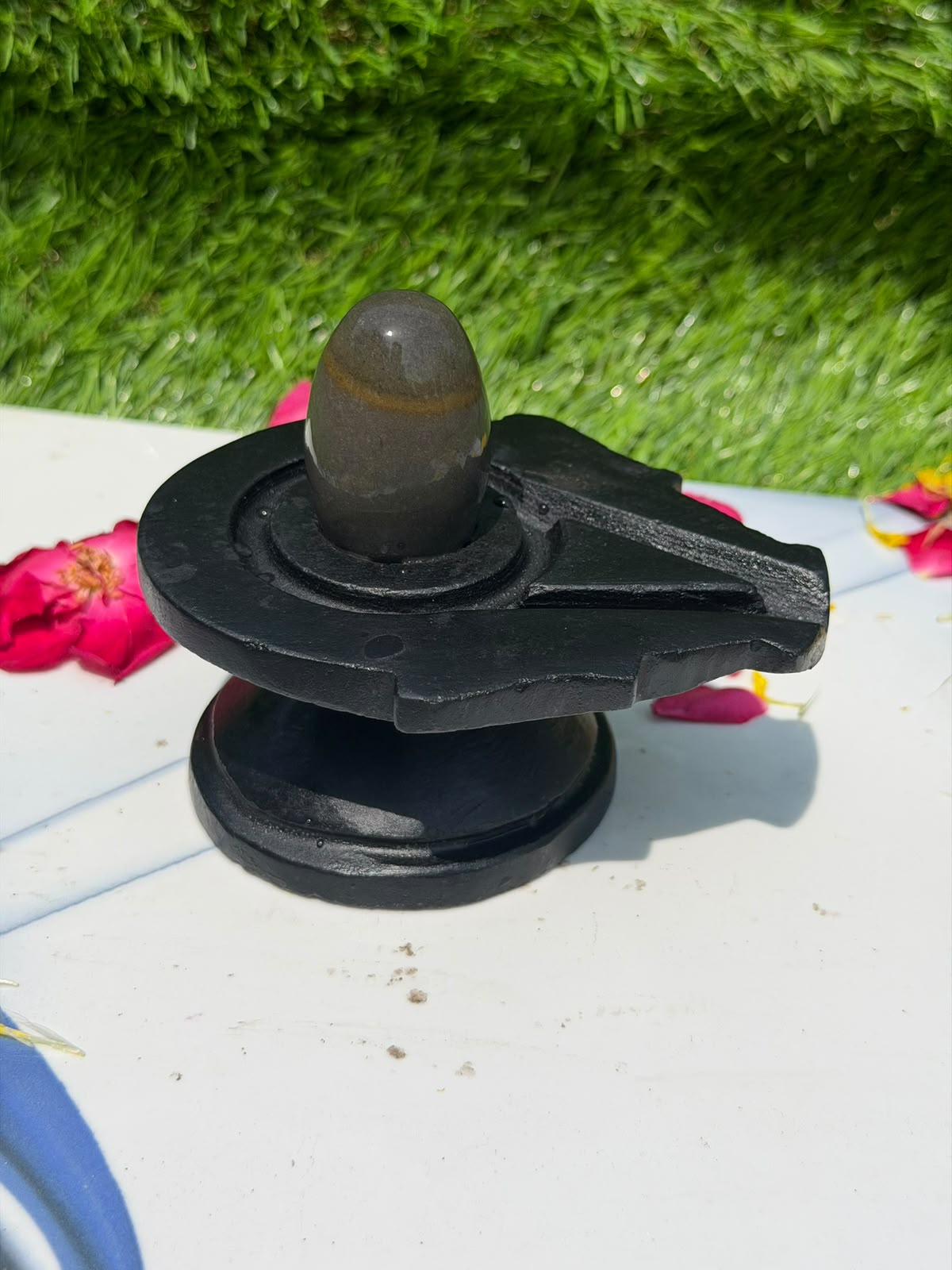2-inch Narmadeshwar Shivling · Ochre Band on Charcoal — Original product photo