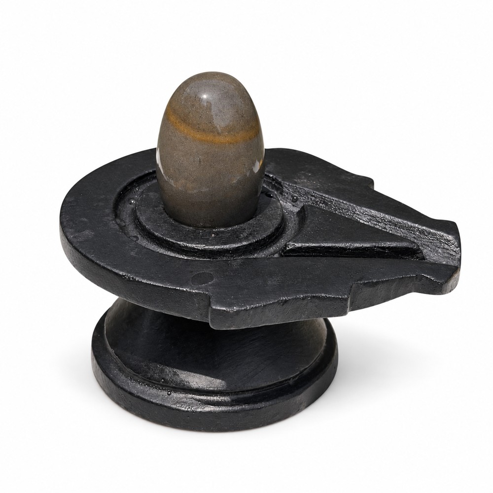 2-inch Narmadeshwar Shivling · Ochre Band on Charcoal — White background edit